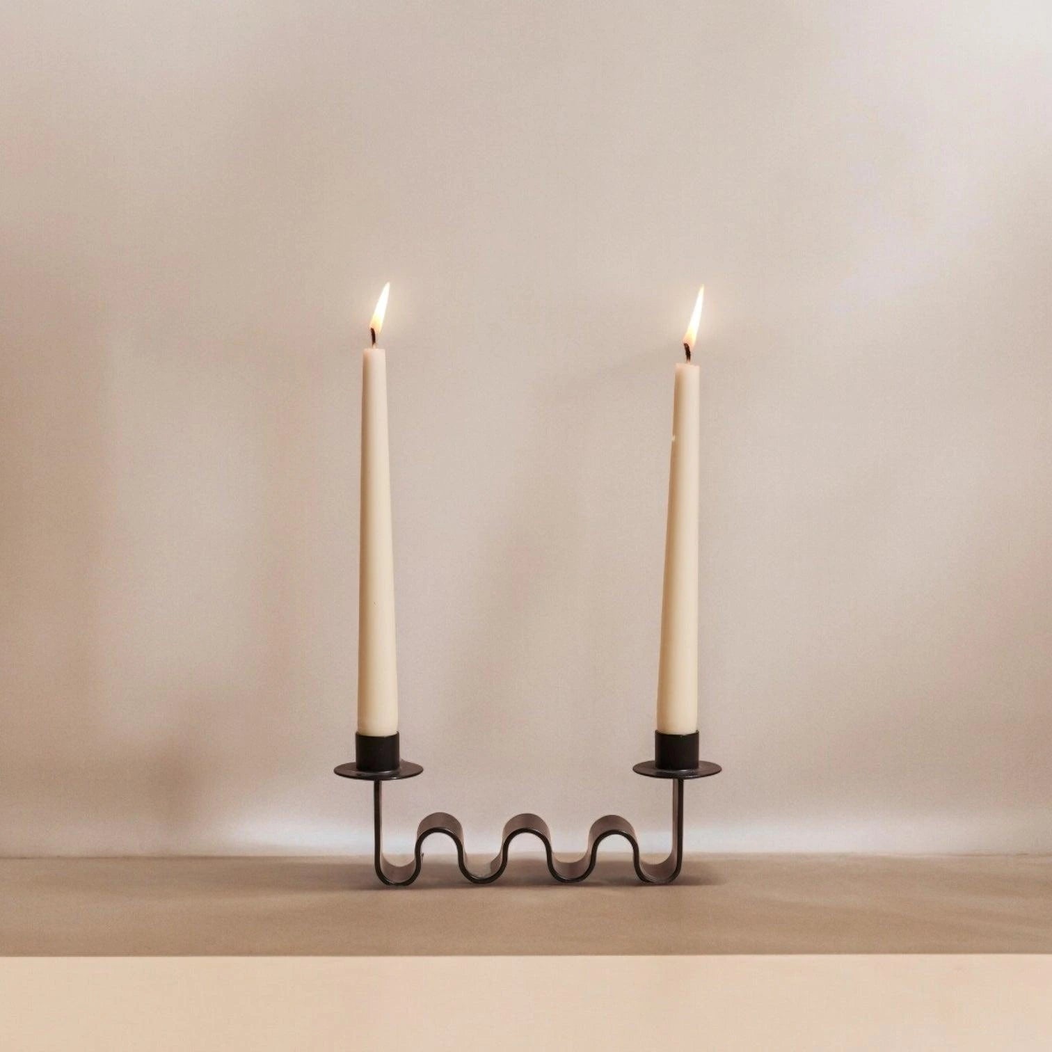 Wavy black candle holder