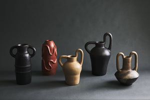 Collection of various handmade glazed clay vases made in oaxaca mexico