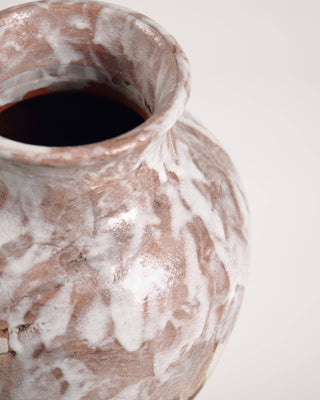 Opening of ceramic vase on white background.