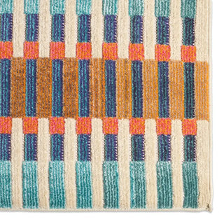 Colorful woven pattern on a textured surface