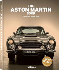 Book cover of 'The Aston Martin Book' with a vintage Aston Martin car