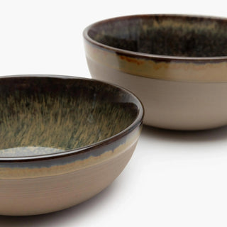 Two ceramic bowls with a rustic finish 