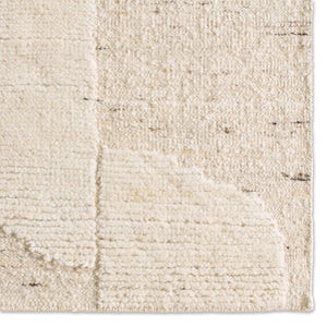 Close-up of a textured beige rug 