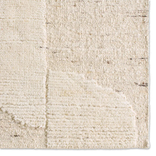 Close-up of a textured beige rug 