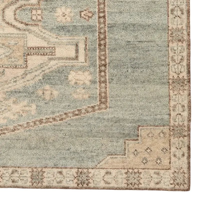 Traditional pattern rug hand woven in India 
