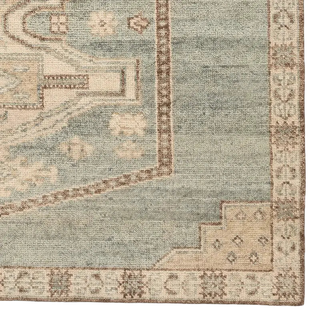 Traditional pattern rug hand woven in India 
