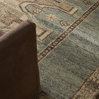 Traditional pattern rug hand woven in India 
