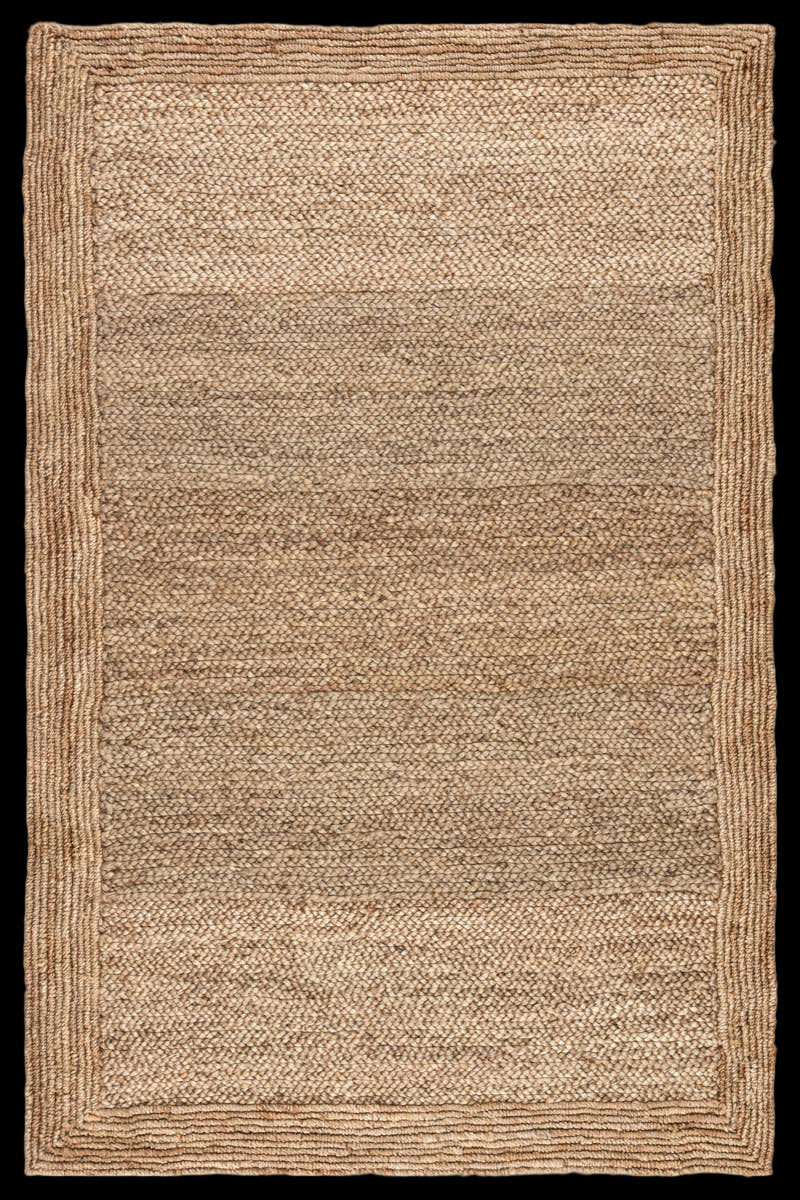 Beige woven jute rug with a natural fiber texture