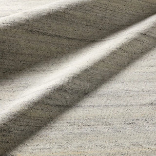 Textured area rug with a gradient grey pattern 