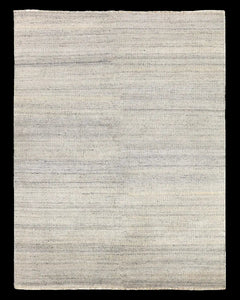 Textured area rug with a gradient grey pattern 