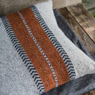 Textured fabric with brown, gray, and black pattern 