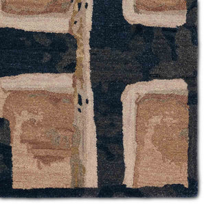 Rectangular rug with geometric pattern in brown, black, peach and beige