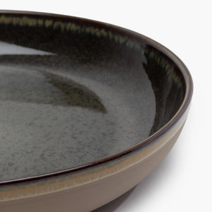 Close-up of a ceramic plate with a gradient finish 