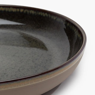 Close-up of a ceramic plate with a gradient finish 