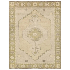 Beige area rug with geometric pattern 