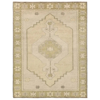 Beige area rug with geometric pattern 
