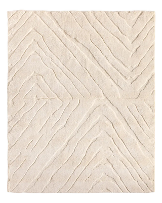 Beige textured area rug with wavy pattern 