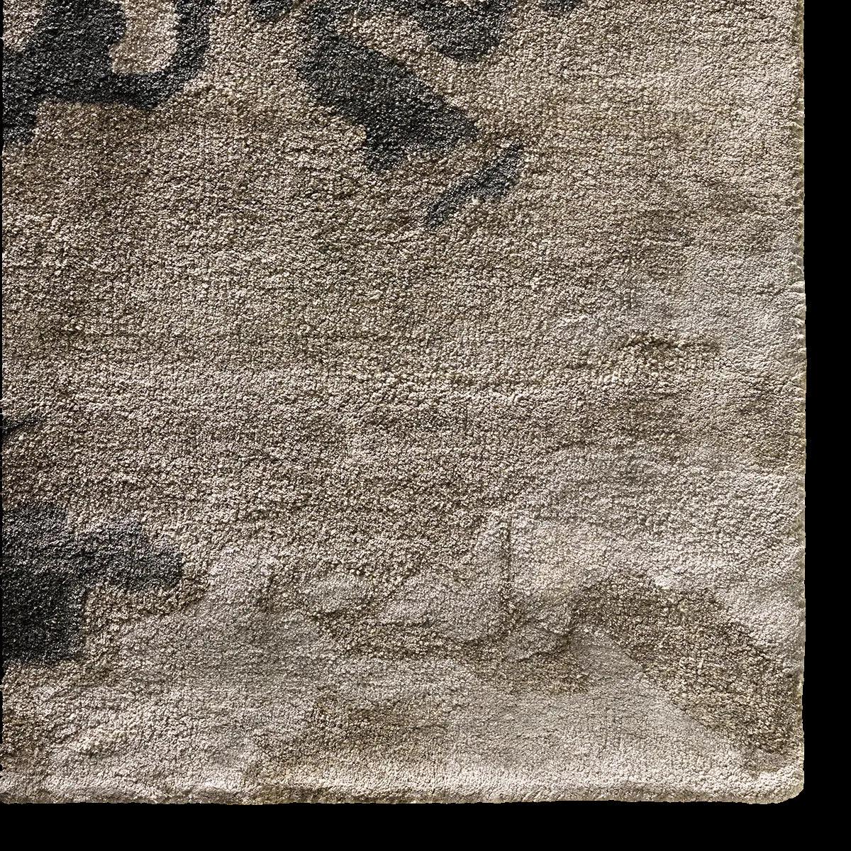 Textured area rug with abstract pattern 