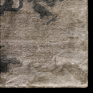 Textured area rug with abstract pattern 