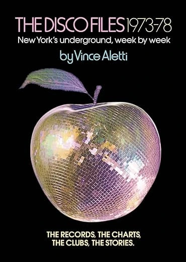 Book cover of 'The Disco Files 1973-78' with a disco ball and text on a black background