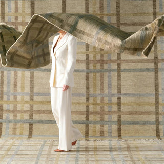 plaid pattern rug with person