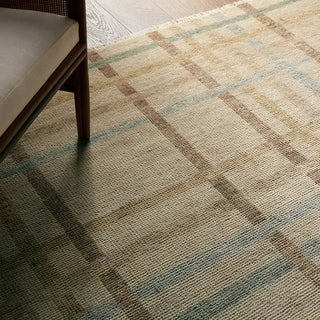 Patterned carpet with geometric design in a room setting