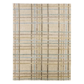 Plaid patterned rug with beige, brown, and blue colors on a white background