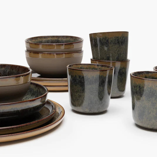 Set of ceramic bowls and cups with a brown and black glaze
