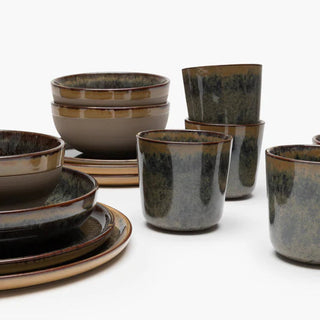 Set of ceramic bowls and cups with a brown and black glaze