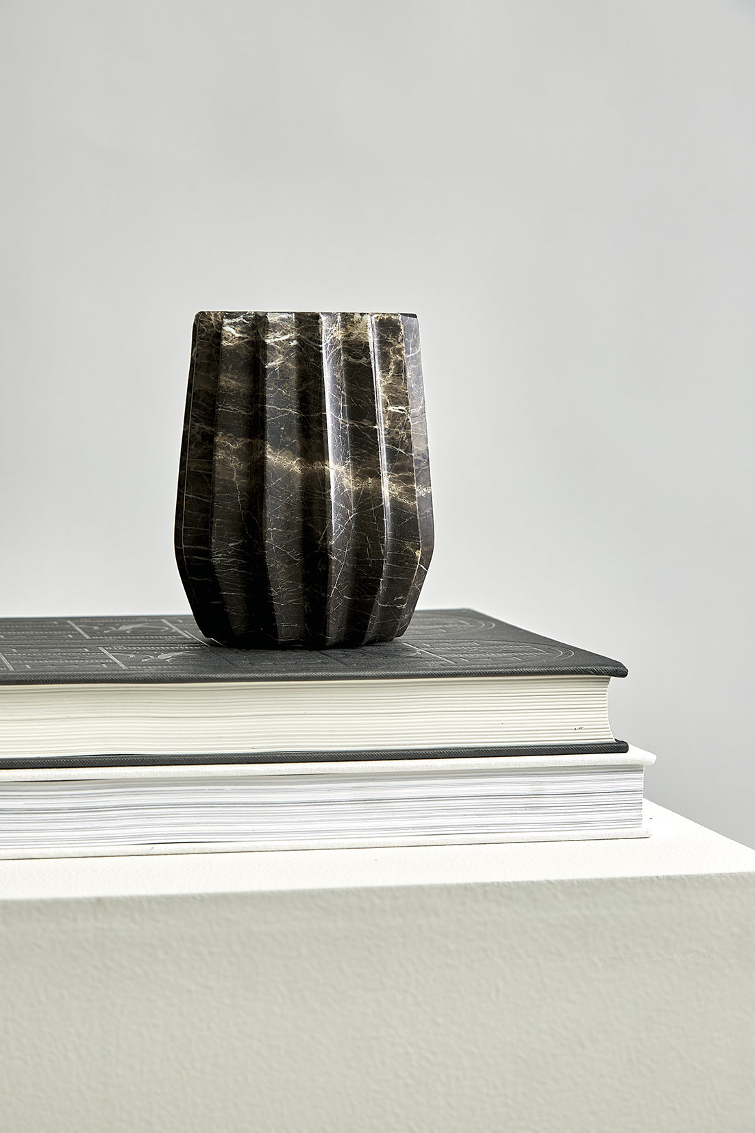 Duna sculptural vase from Monterrey black marble with white veining hand-carved in Mexico