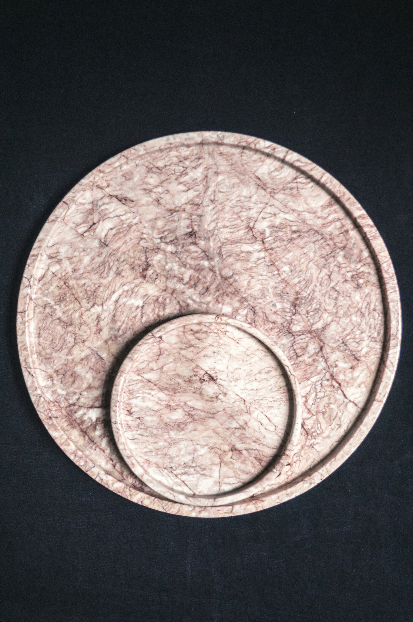Set of Two Merida Trays hand-carved from Mexican Jaspe Rose Marble featuring bold veining pattern