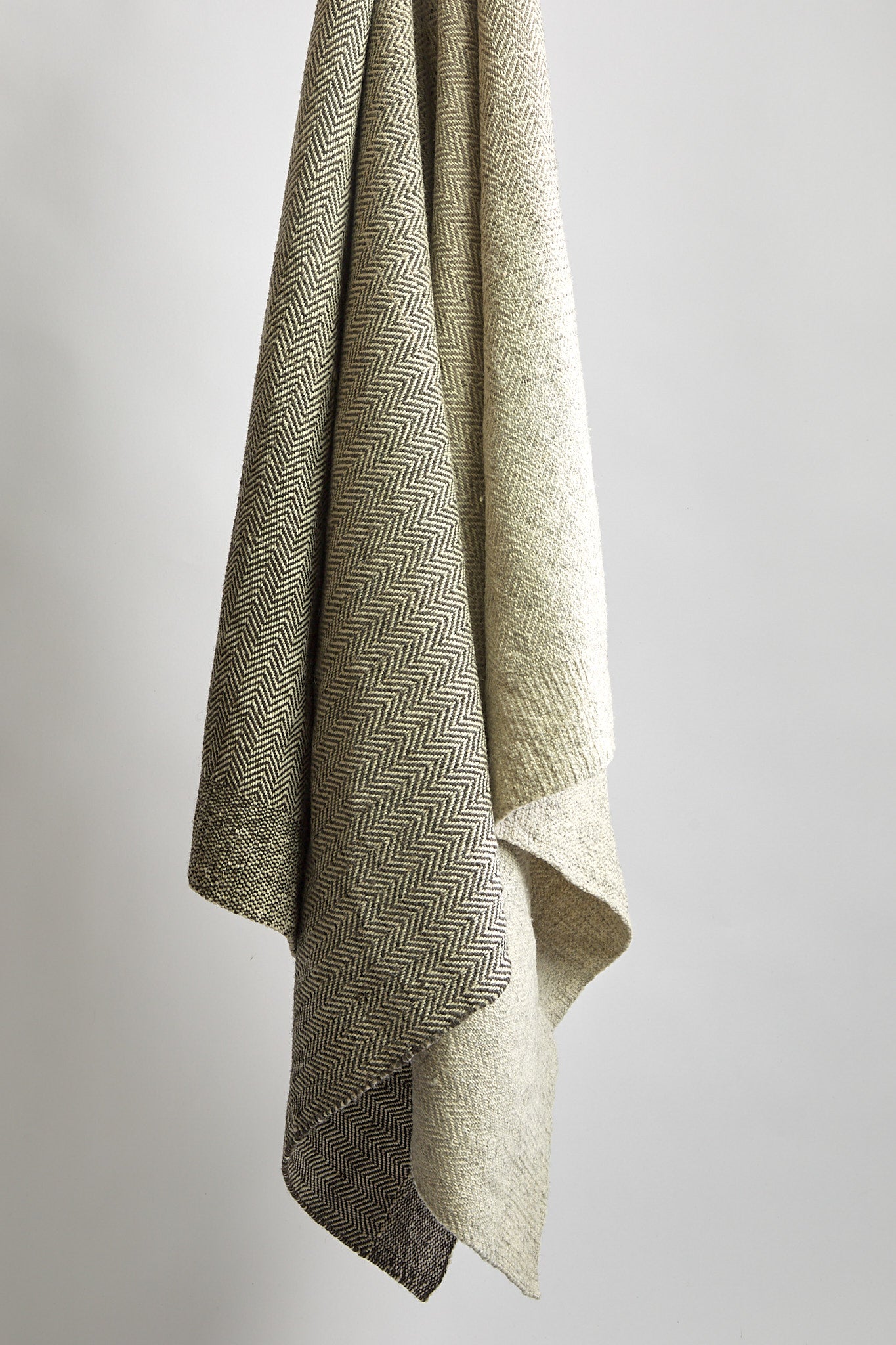 Natural wool throw blanket chevron pattern ombre color effect in light to dark neutral beige color handwoven in Mexico