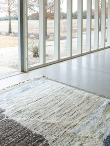 Organic pattern area rug neutral color New Zealand sheep wool hand woven by women of Moroccan Beni M’rirt tribe