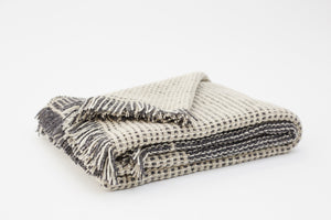 Time decorative throw blanket gray and cream colors plaid pattern in Merino wool from Provence France handwoven in Barcelona