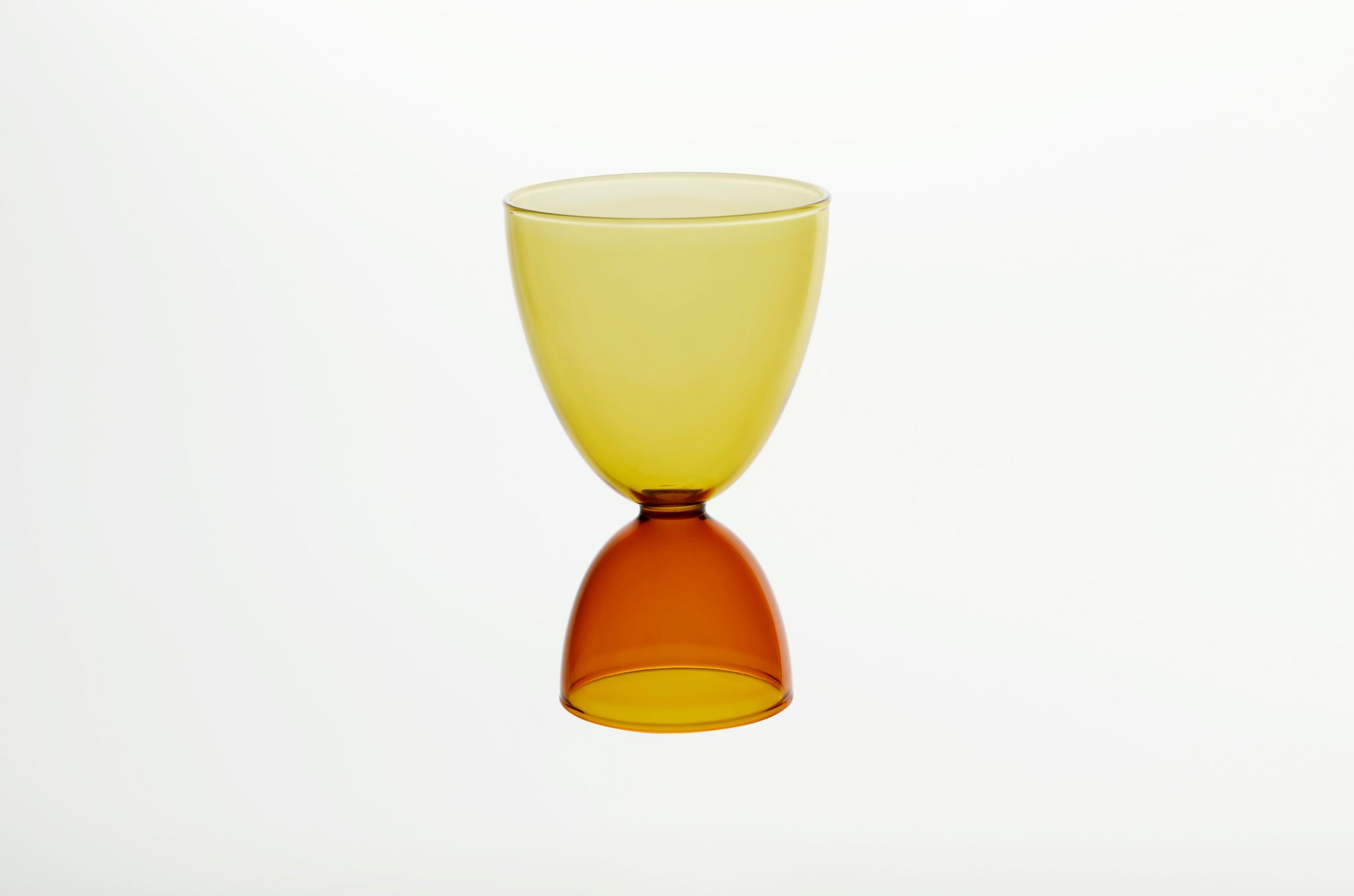 elysian collective hourglass duotone honey amber cocktail glass by mamo